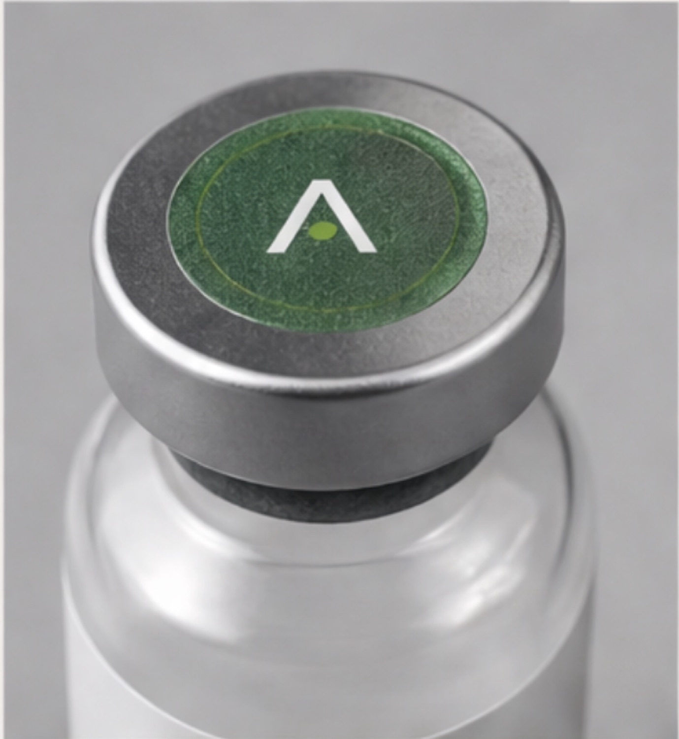 The Made 'A' logomark on a vial cap seal