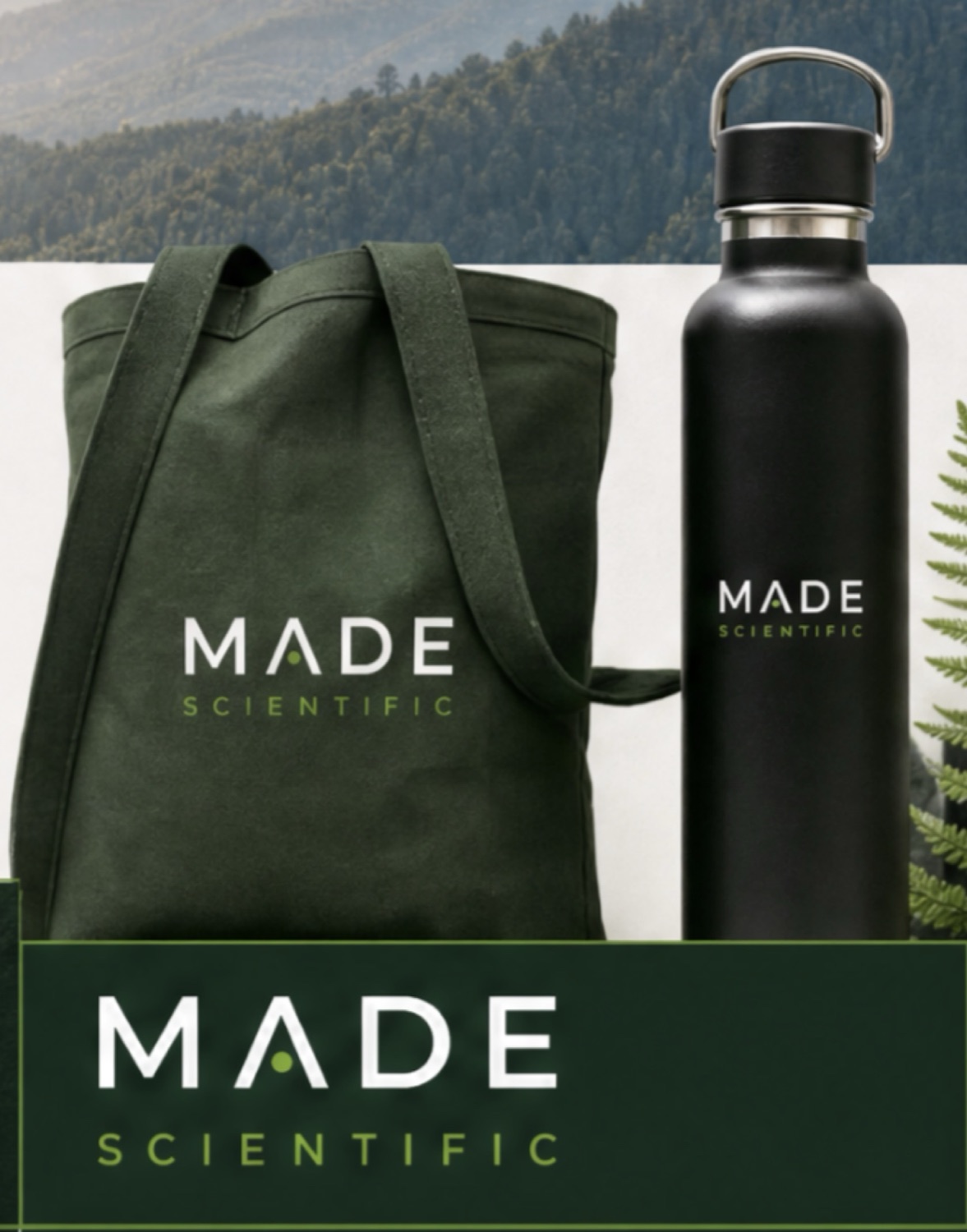 Green tote bag and black water bottle with Made logo